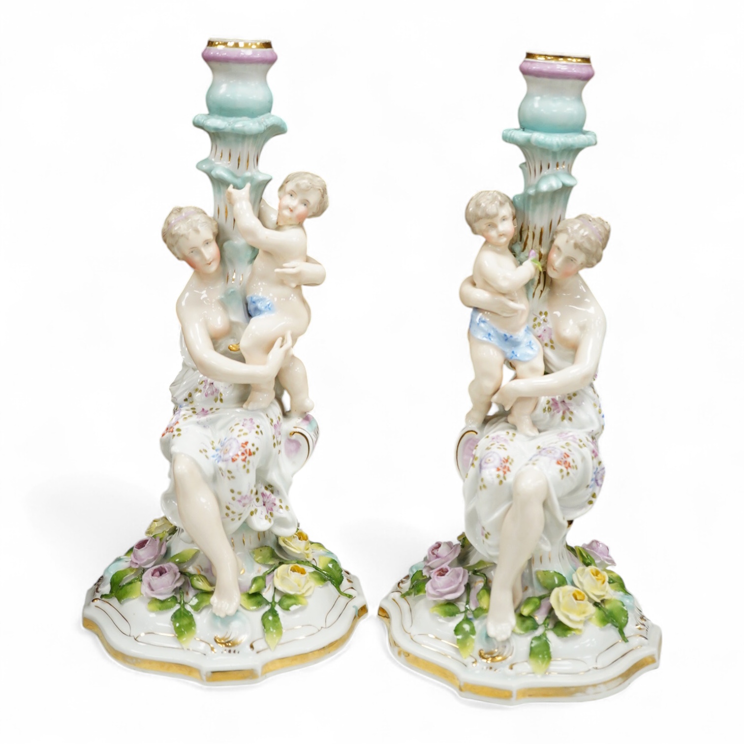A pair of Jacob Petit porcelain figural candlesticks, 34cm